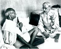 Mahatma Gandhi in conversation with Maulana Abul Kalam Azad.