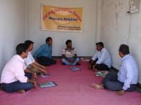 A meeting with Weavers’ Committee members during the visit